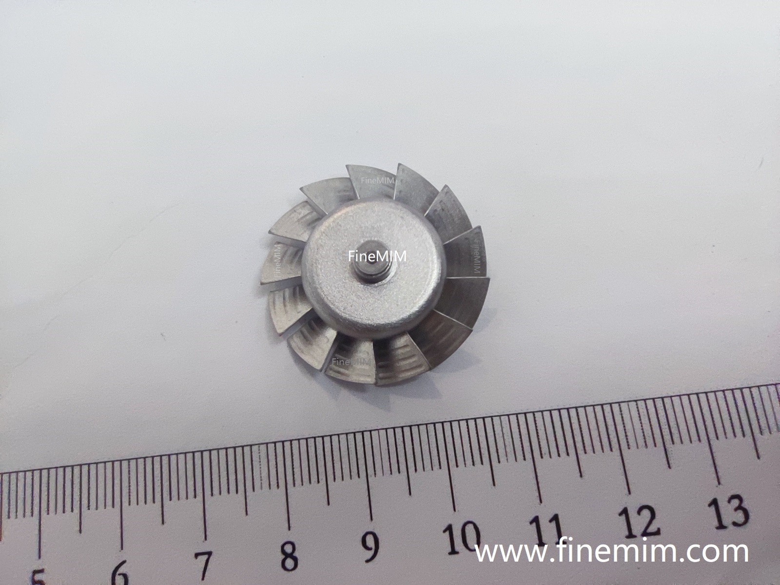 MIM impeller for hair dryer motor